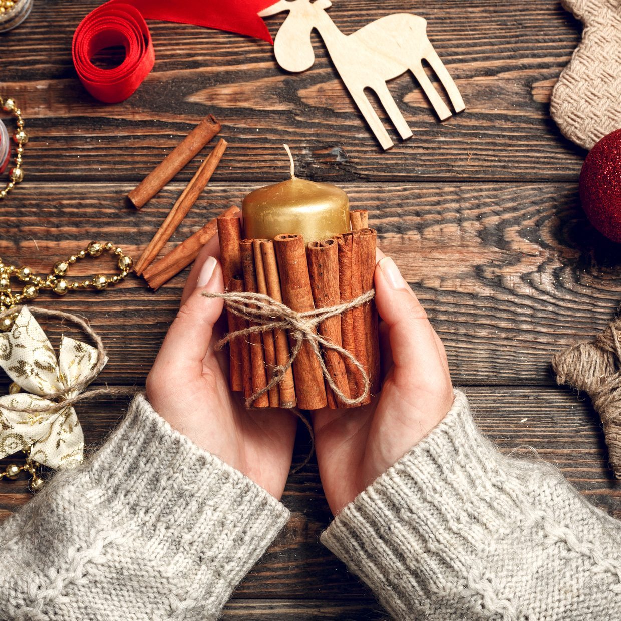 Woman create stylish christmas gifts