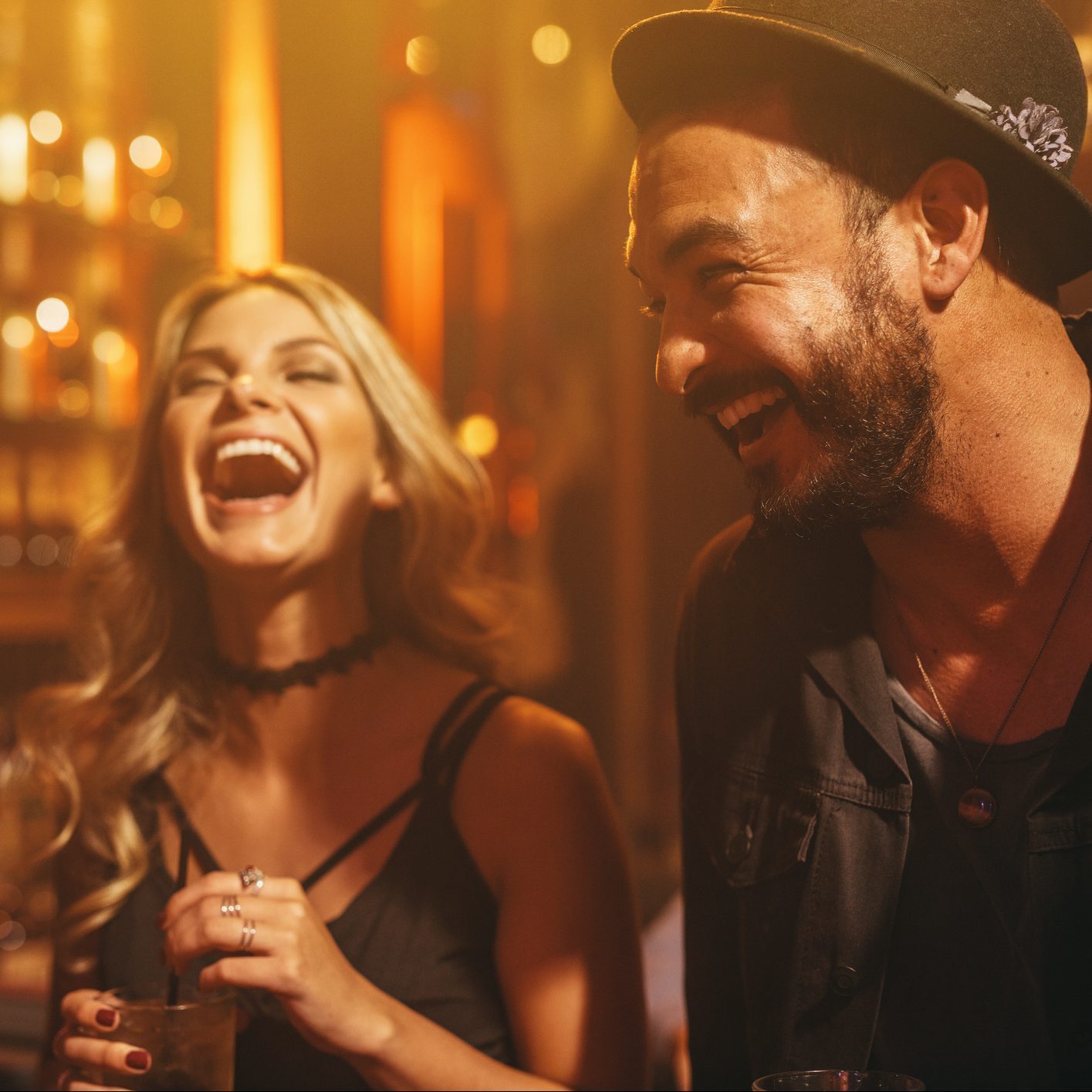 Group of people in the pub having fun
