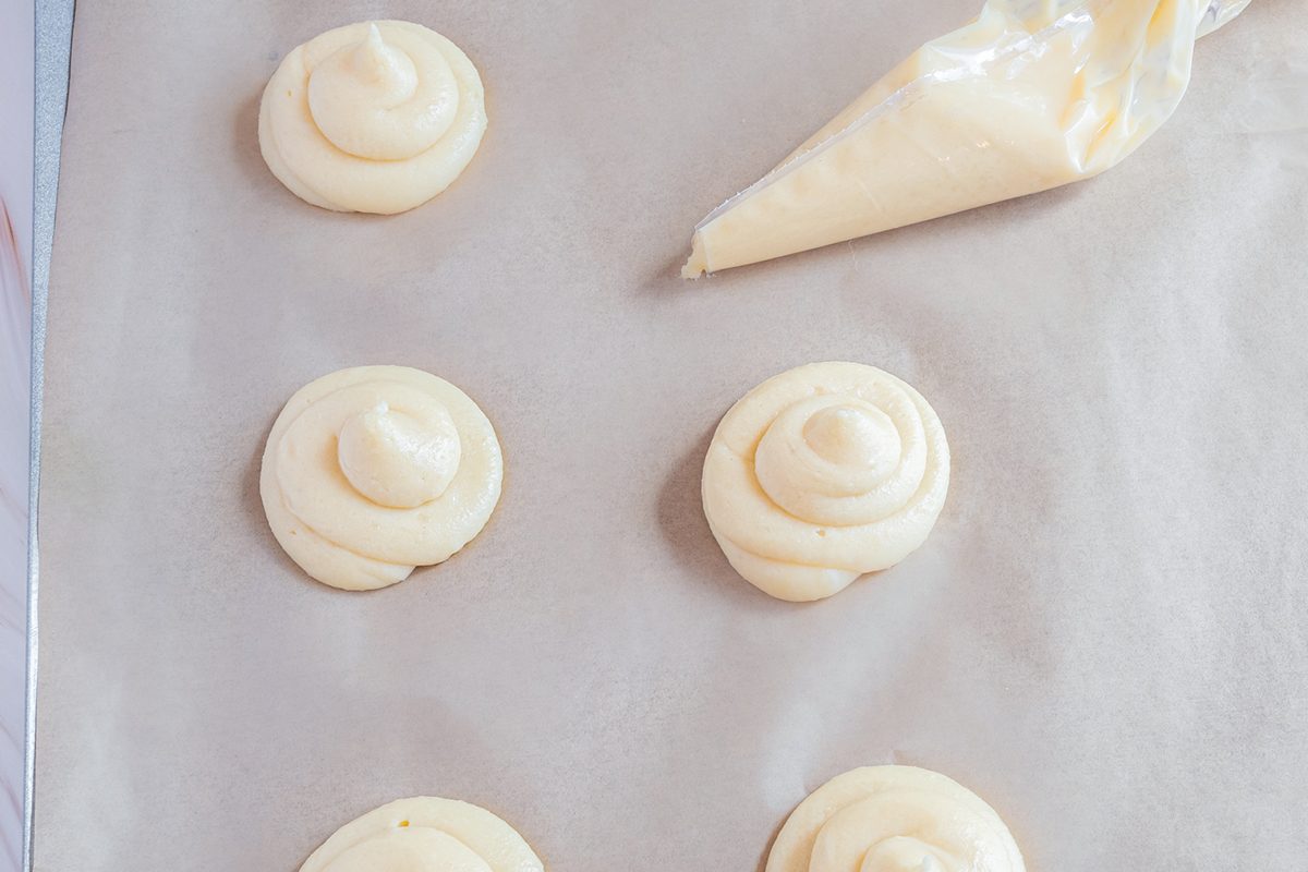 Choux Au Craquelin piping on baking pan