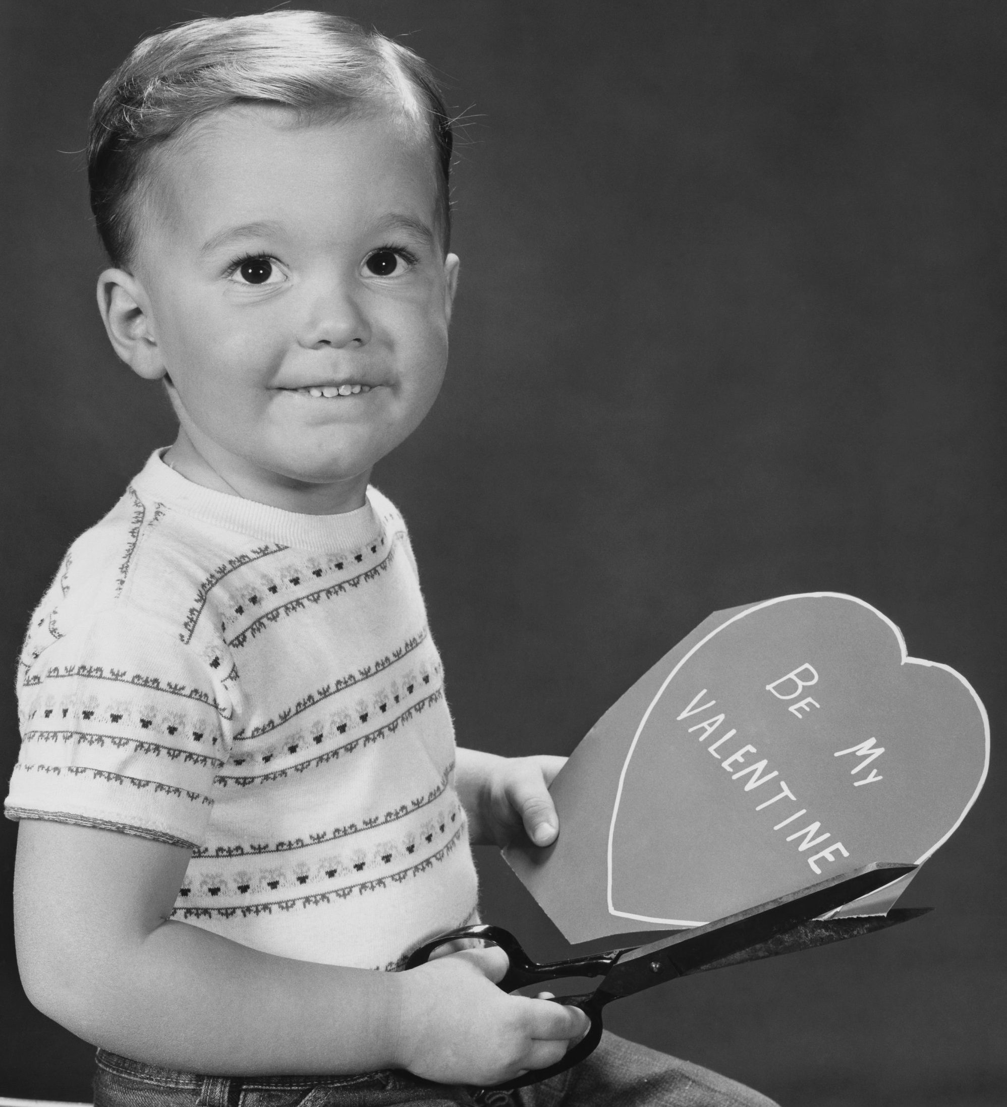 Boy Making Greeting Card For Valentines Day