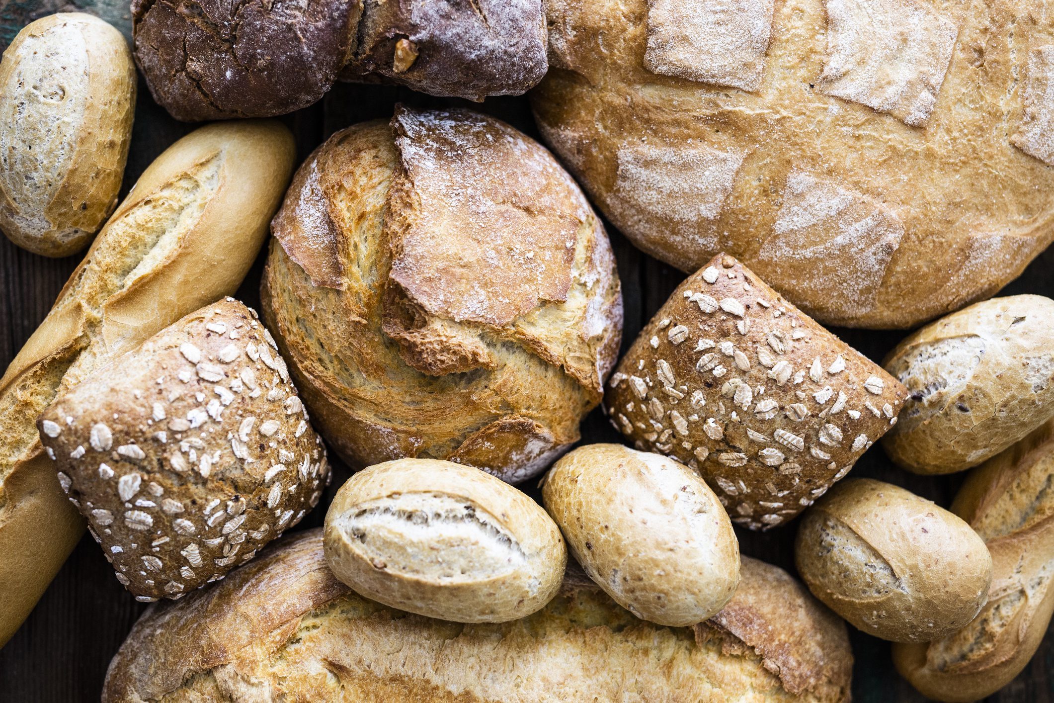 bakers dozen of Various sorts of bread, close-up