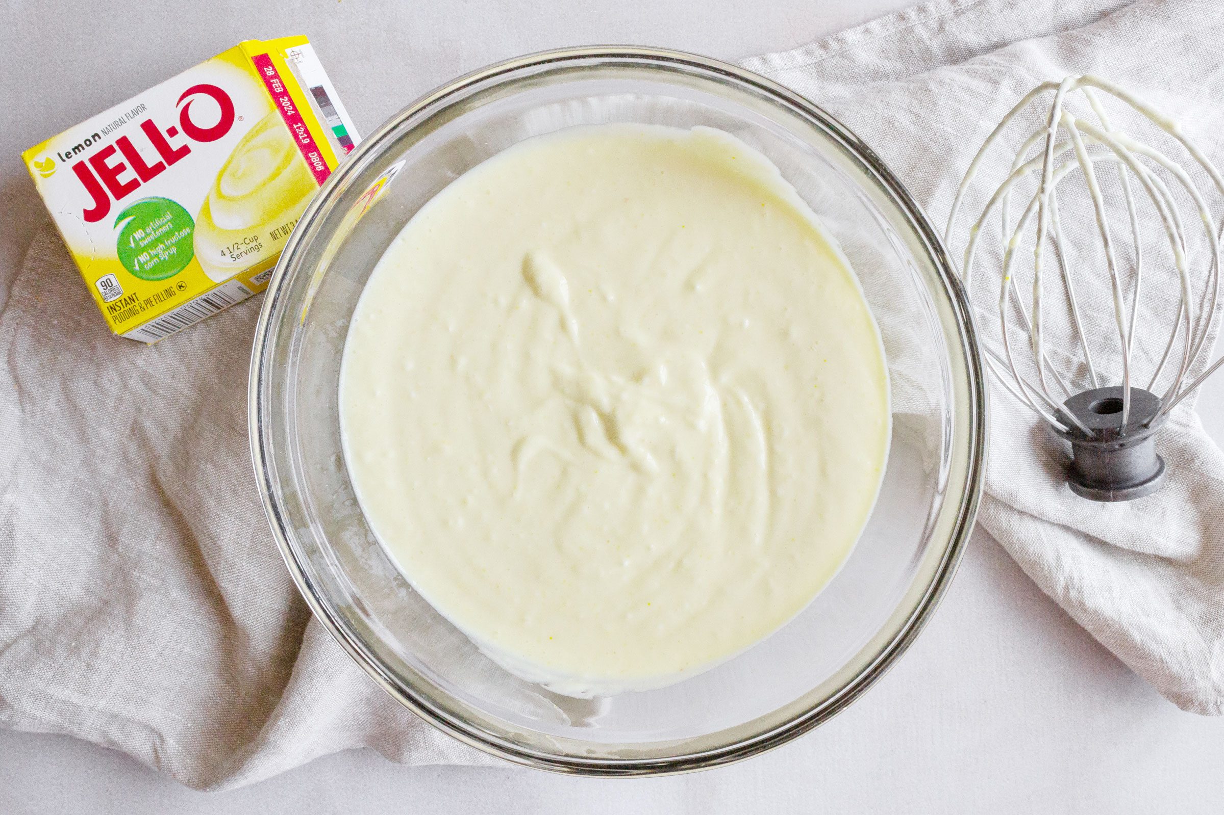 a clear glass bowl with pudding mix