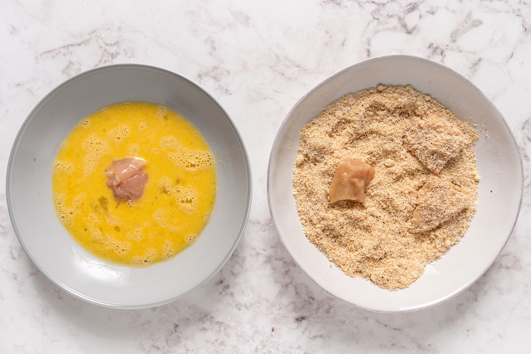 Coating and dipping the chicken nuggets 