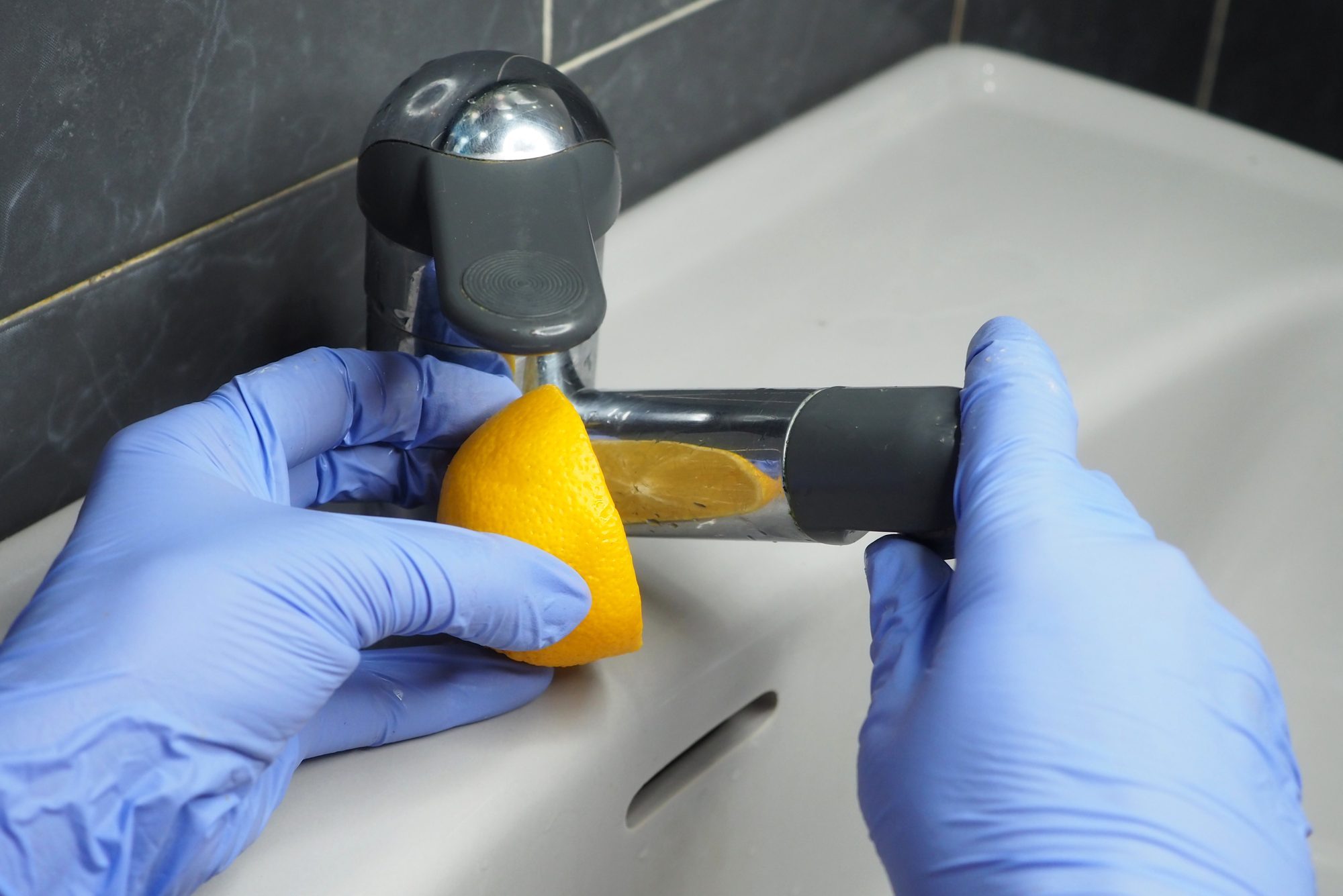 Eco-friendly cleaning in the bathroom with lemon