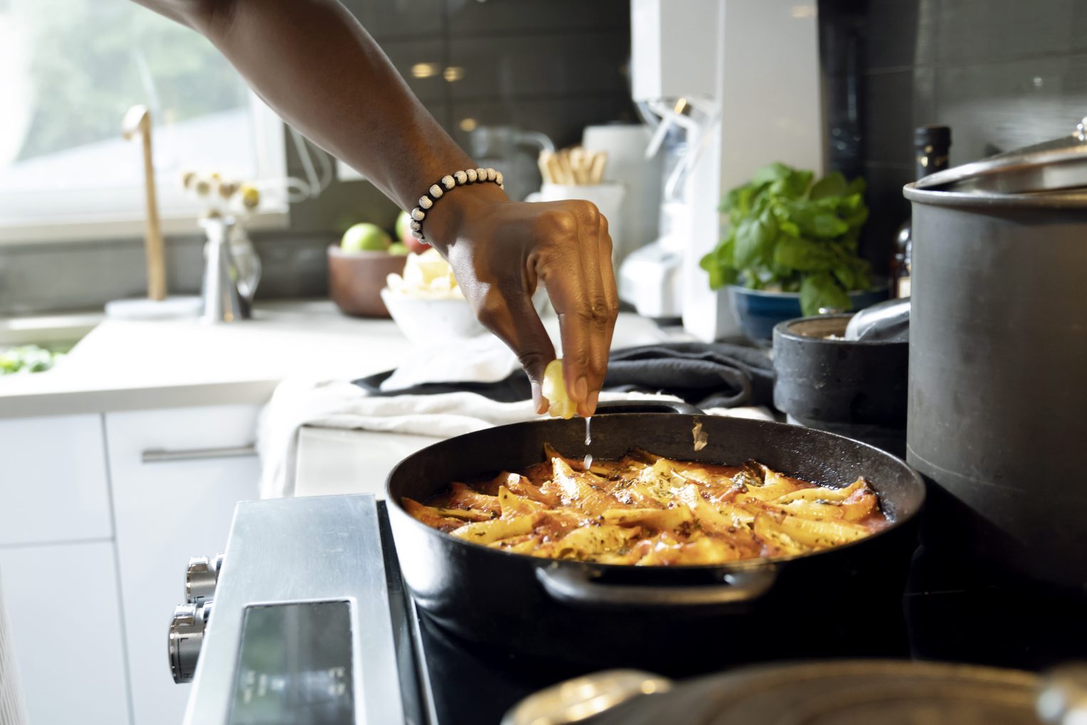 Close up of man cooking in kitchen