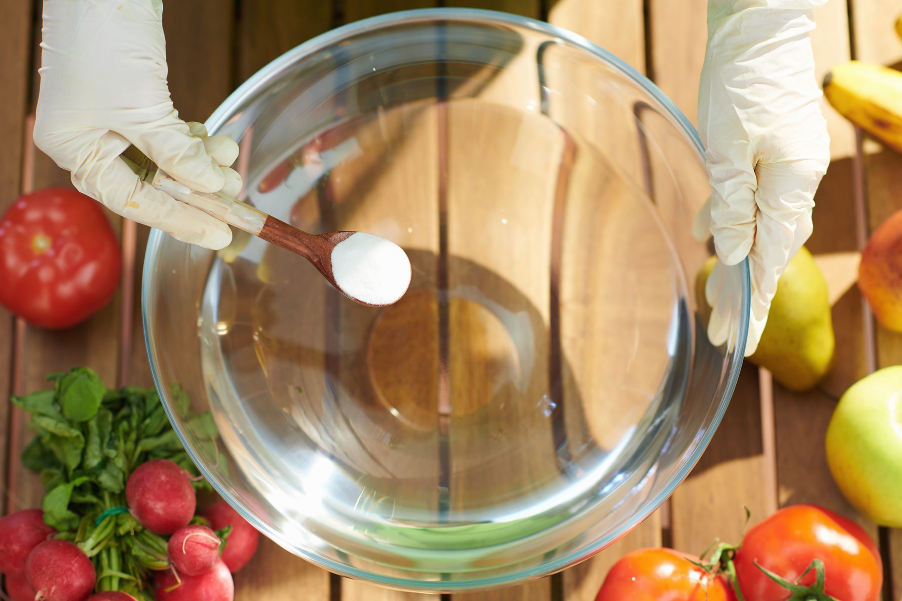 Woman Removes Pesticides With Baking Soda by soaking fruits and vegetables