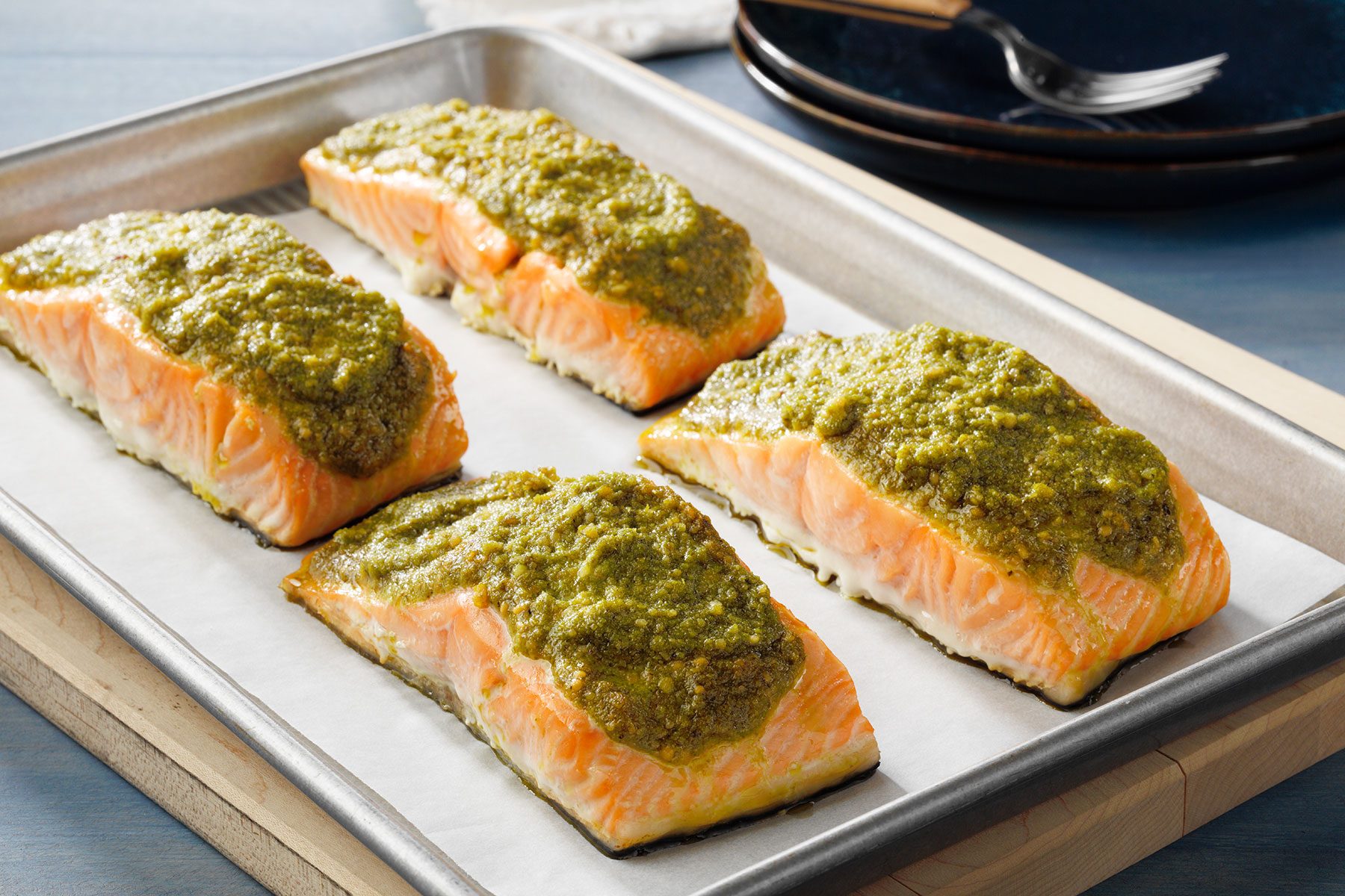 Baked Pesto Salmon cooling on baking sheet