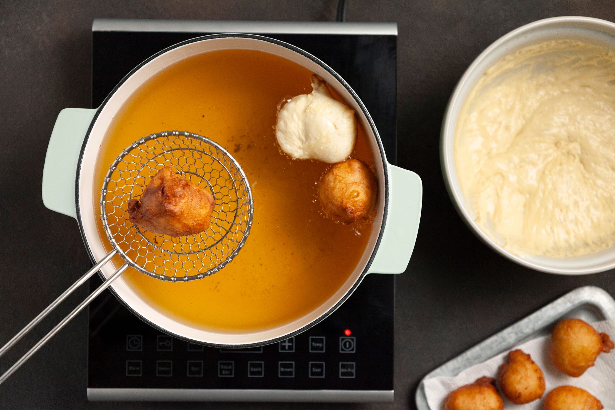 How To Make Zeppole Italian Doughnuts frying the zeppole