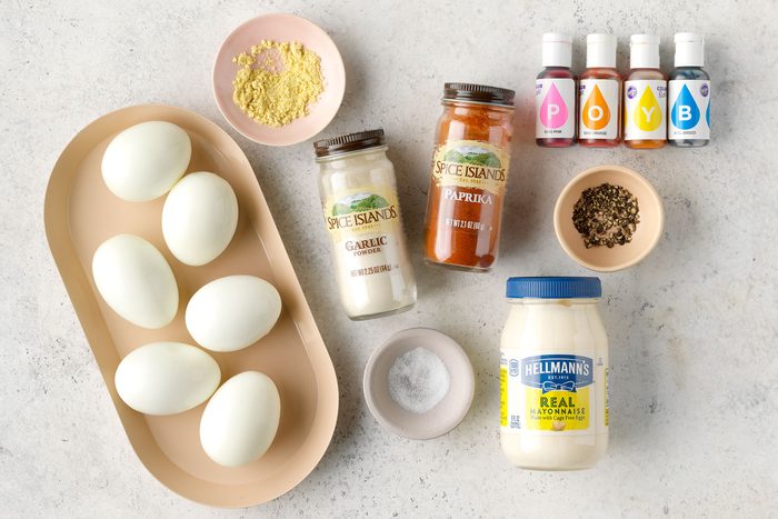 Ingredients for making colourful deviled eggs d