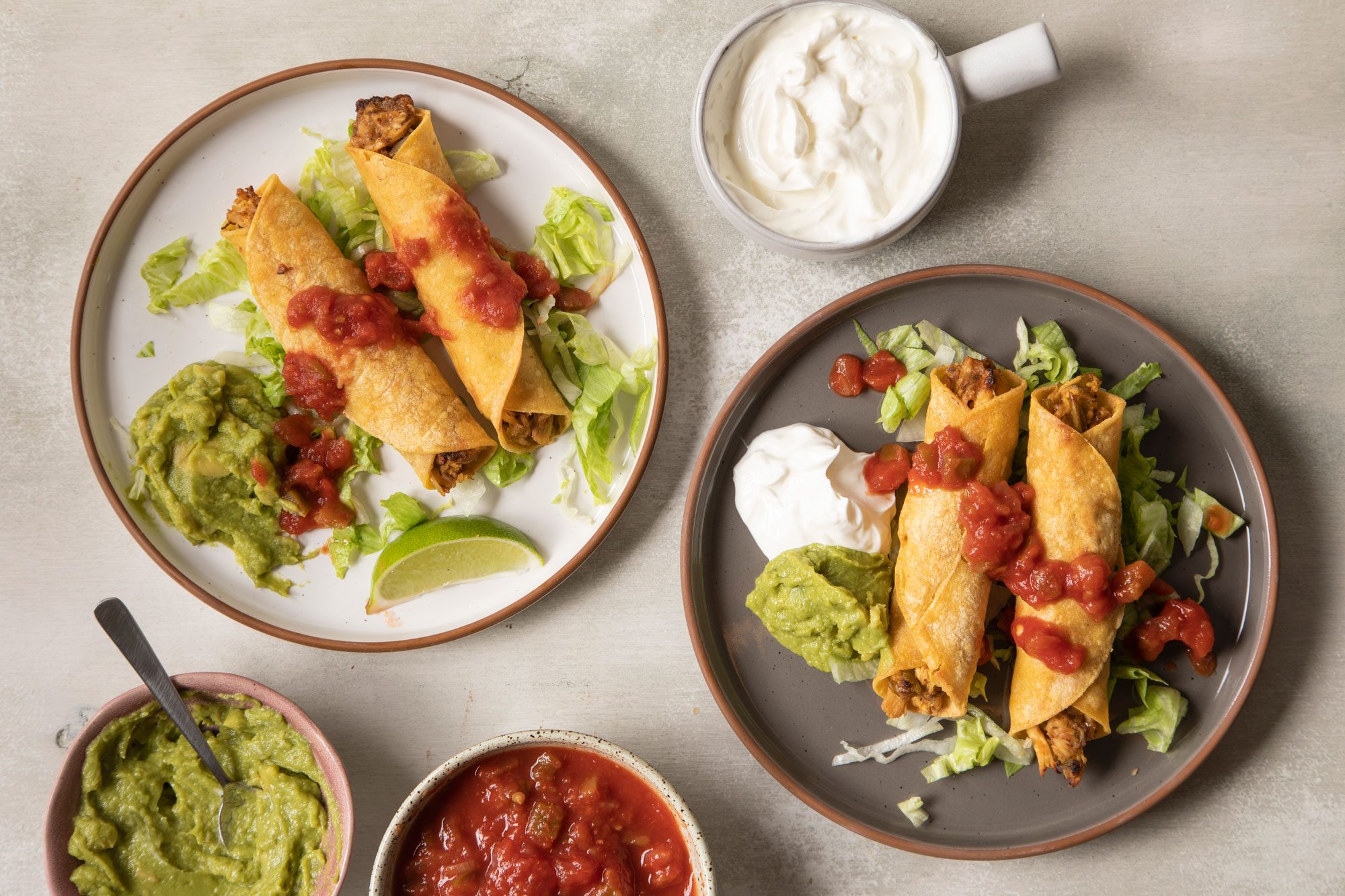 Chicken Taquitos served with sauce and mayo