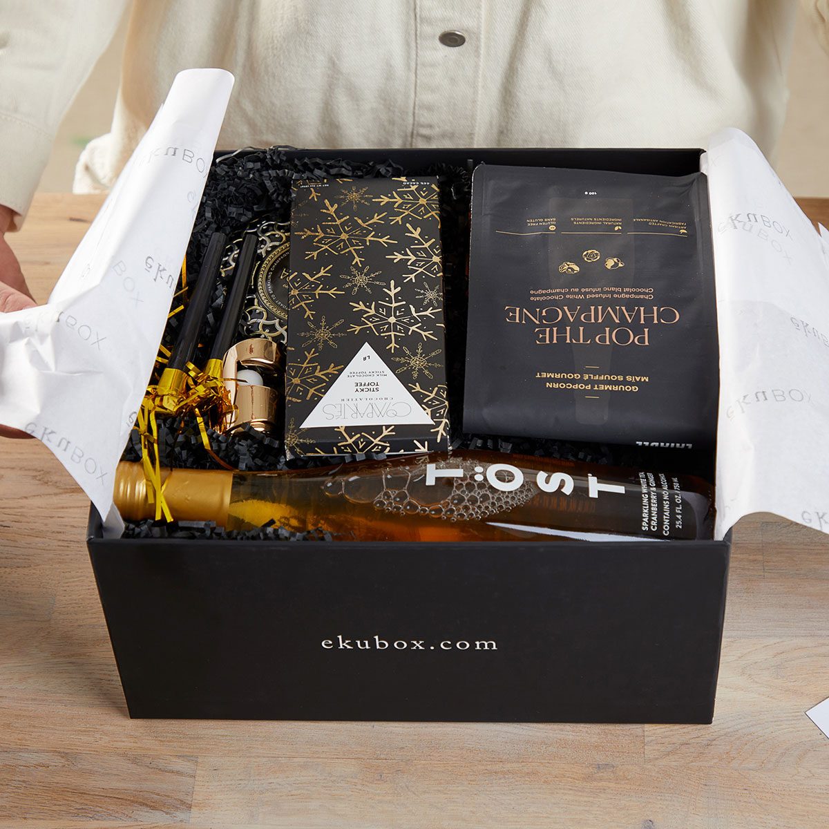 Opened Gift Basket on wooden table