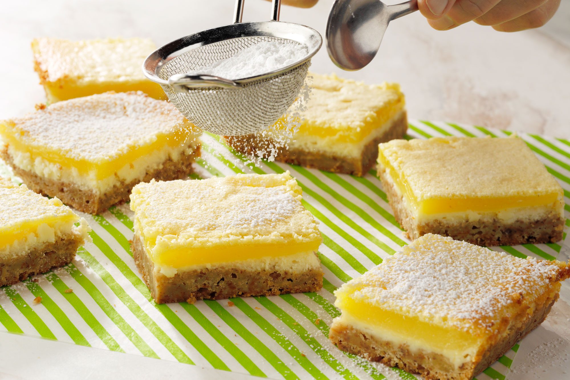 Sprinkle the bars with confectioners' sugar