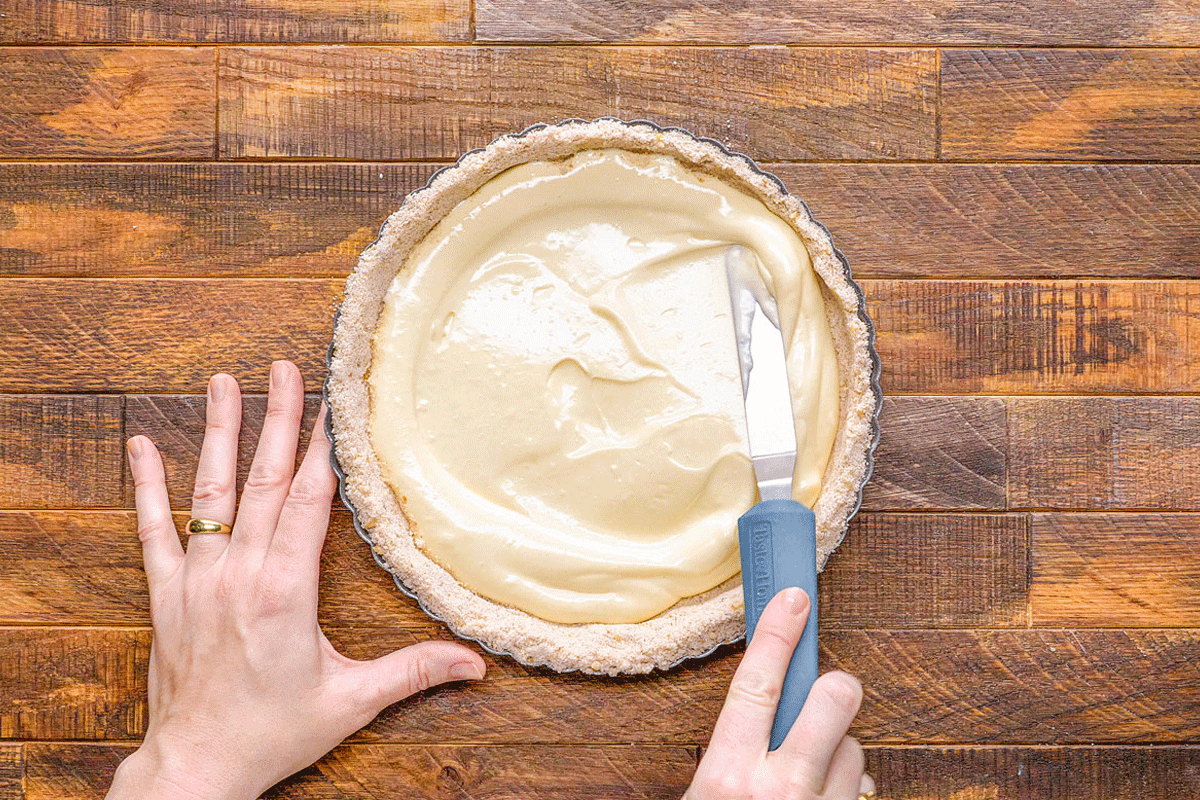 Adding mixture, cheese filling, lemon pears and cinnamon