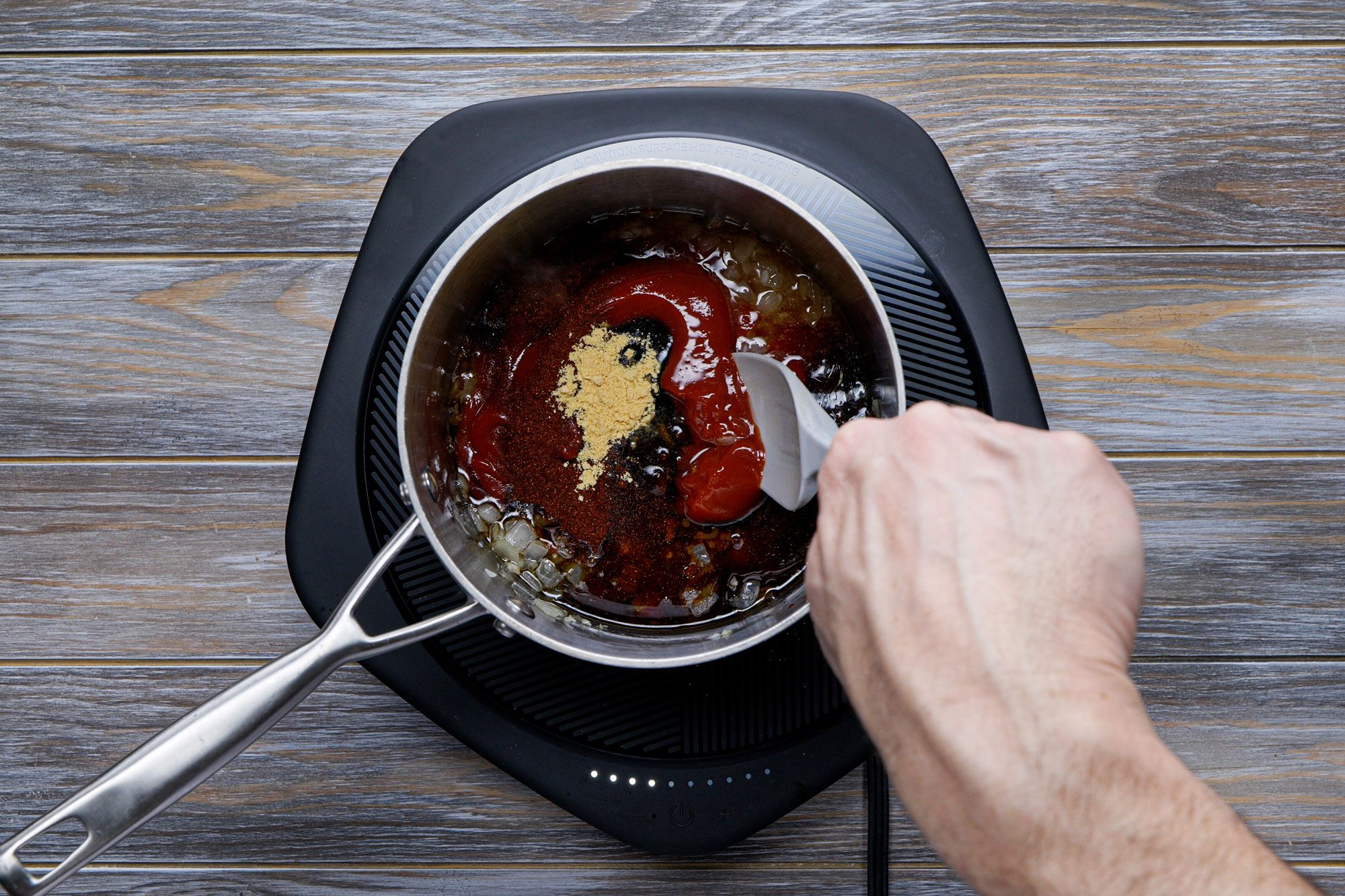 Make the barbecue sauce in a small saucepan 