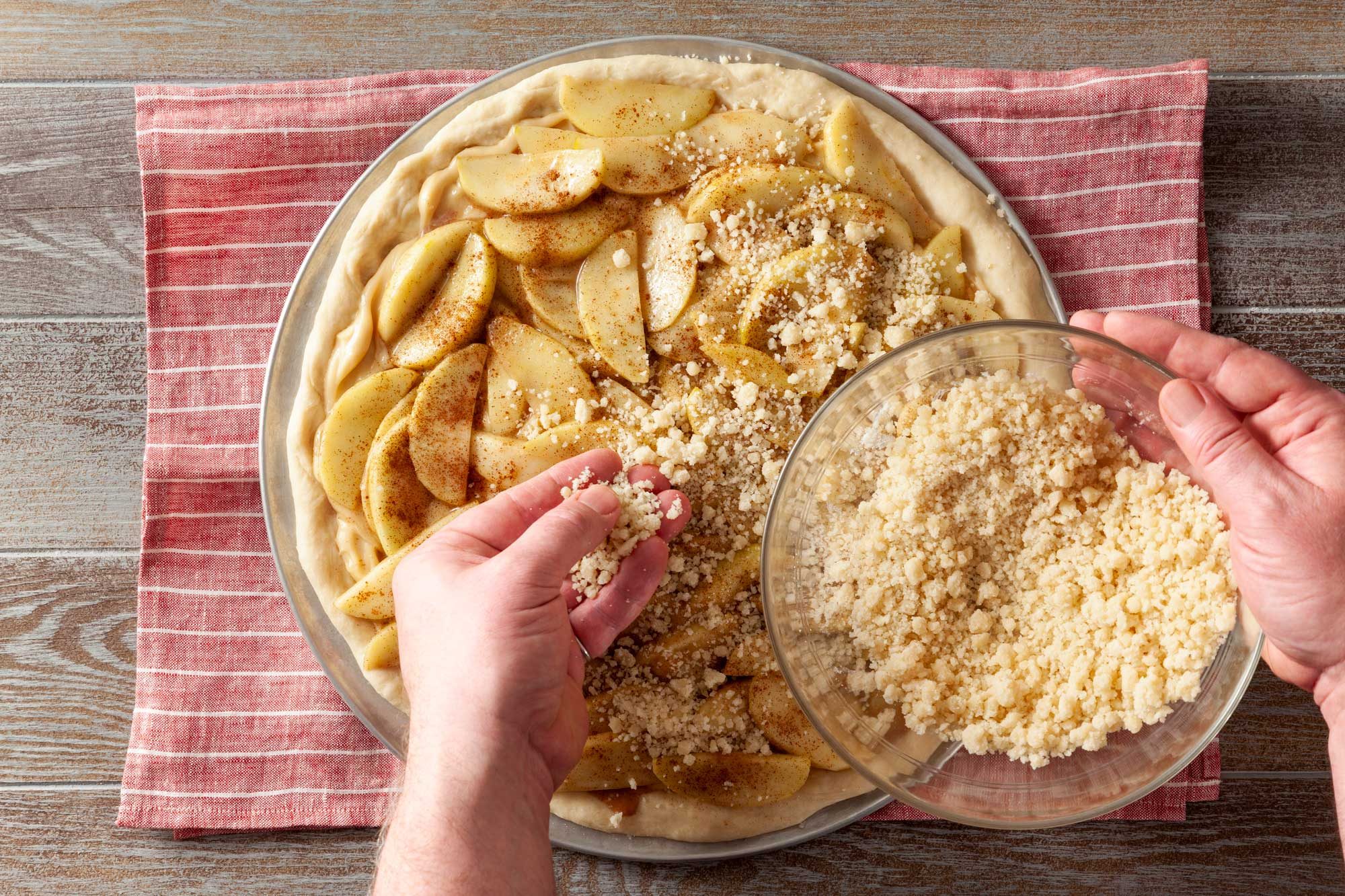 Sprinkle streusel on top of the dough