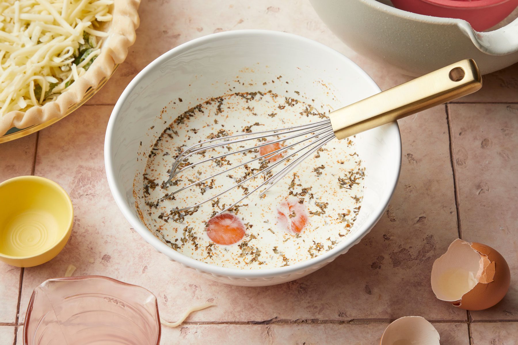 Eggs and cream mixture in a large bowl