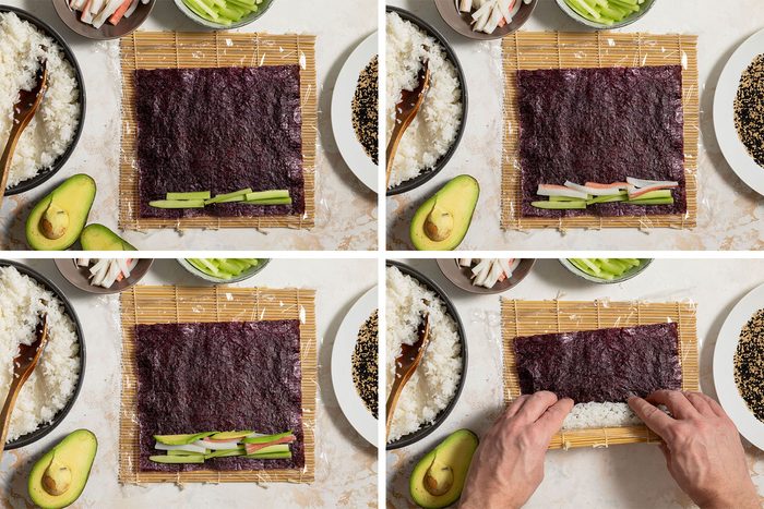 Putting fillings on Nori Paper and rolling it