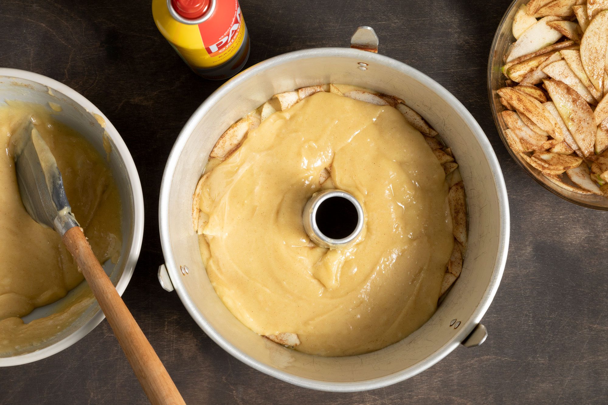 Spread a third of the batter into the pan and half apples, repeat this process again