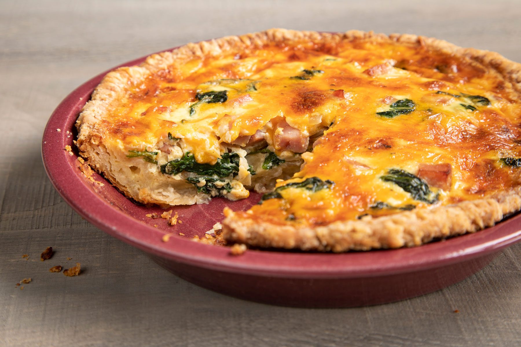 Fully baked pie served in a plate 