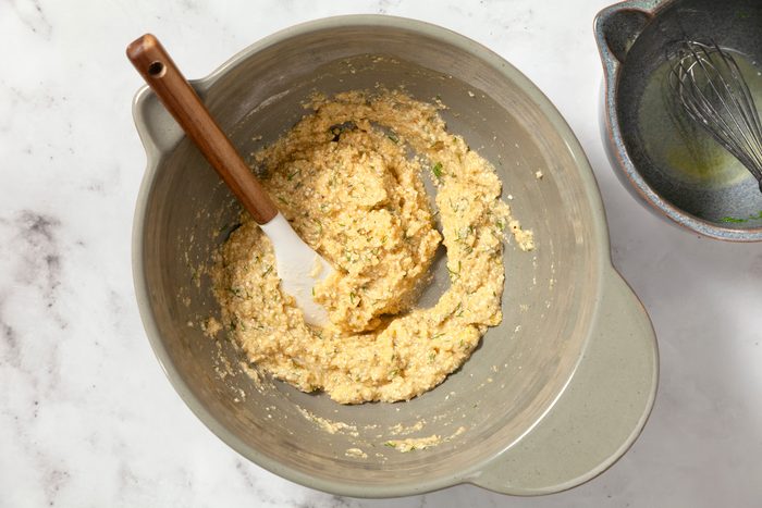 A bowl of mixture with a spoon