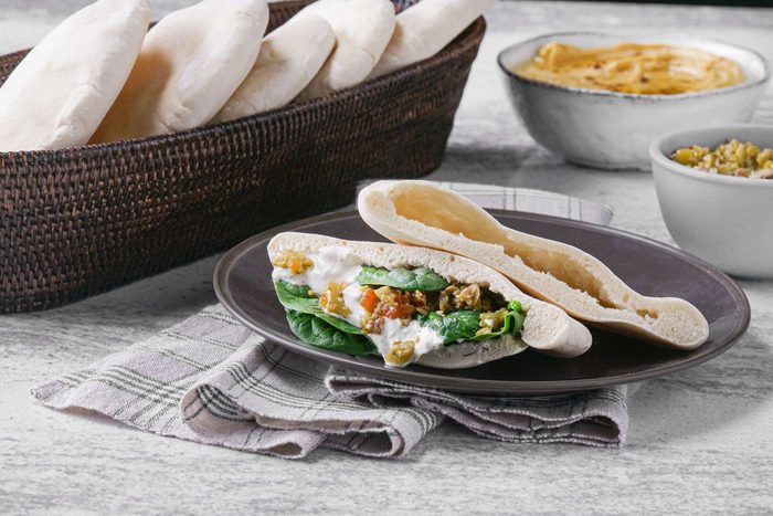 Pita Bread stuffed with cream and mixture served in a small plate