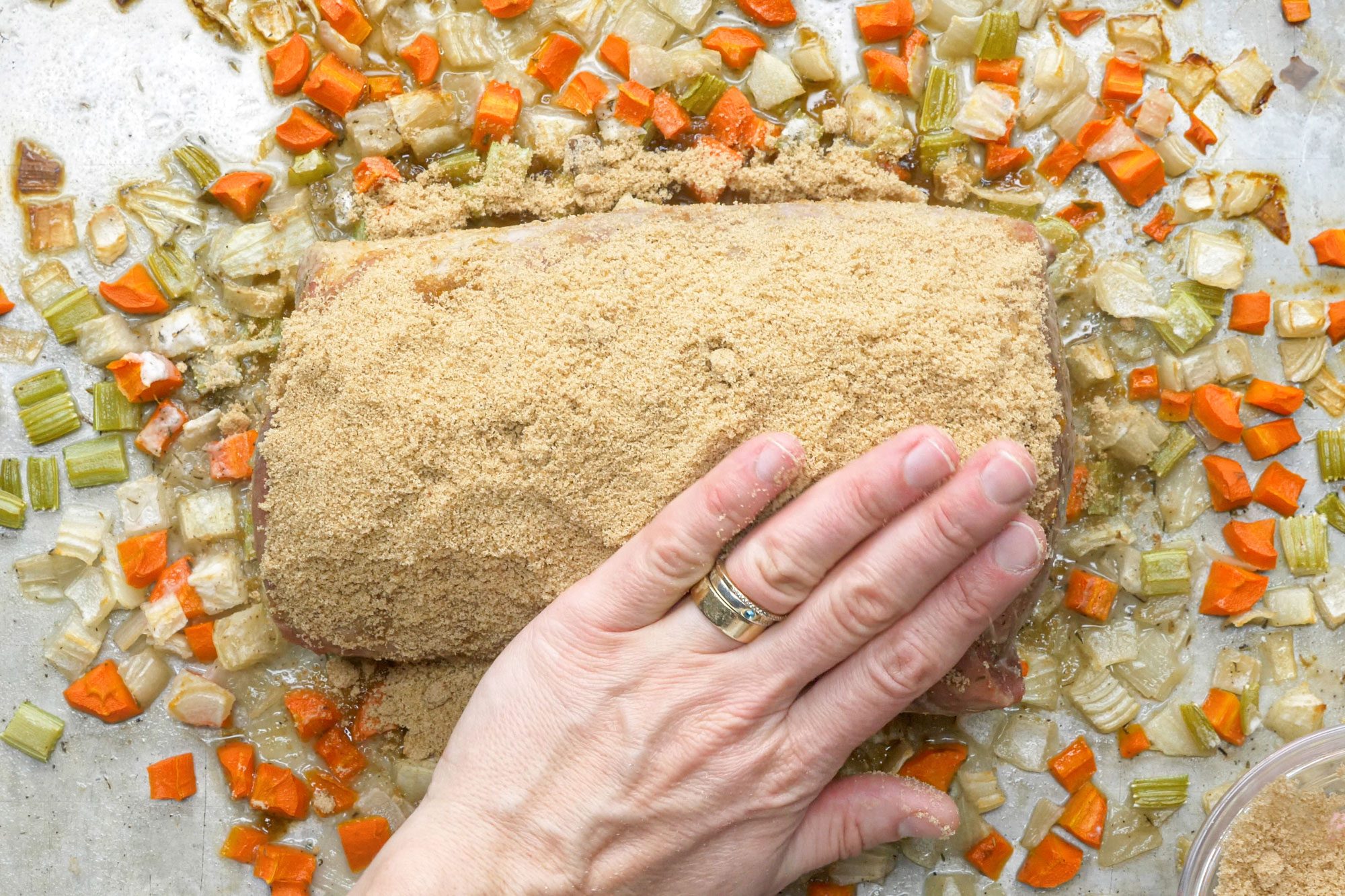 Sprinkle the brown sugar over the top of the roast