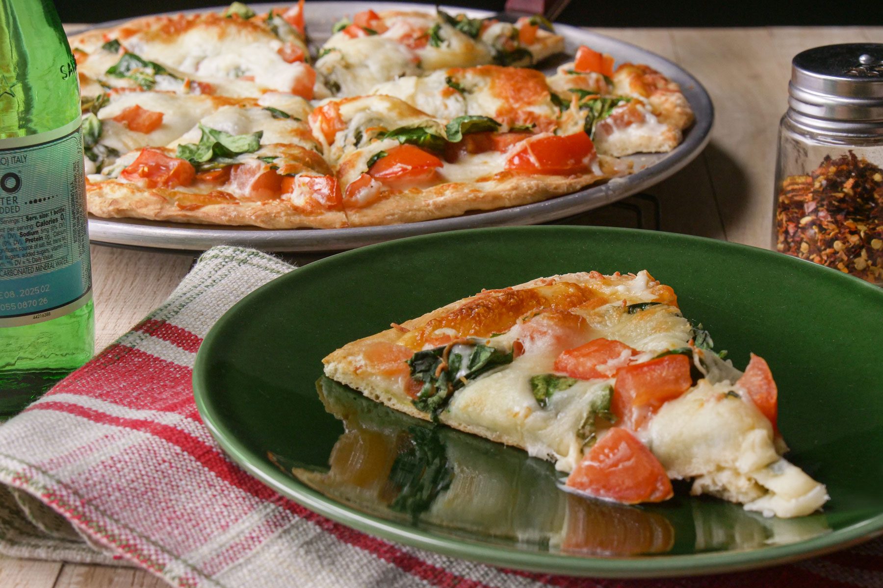 Spinach Pizza served with beverage