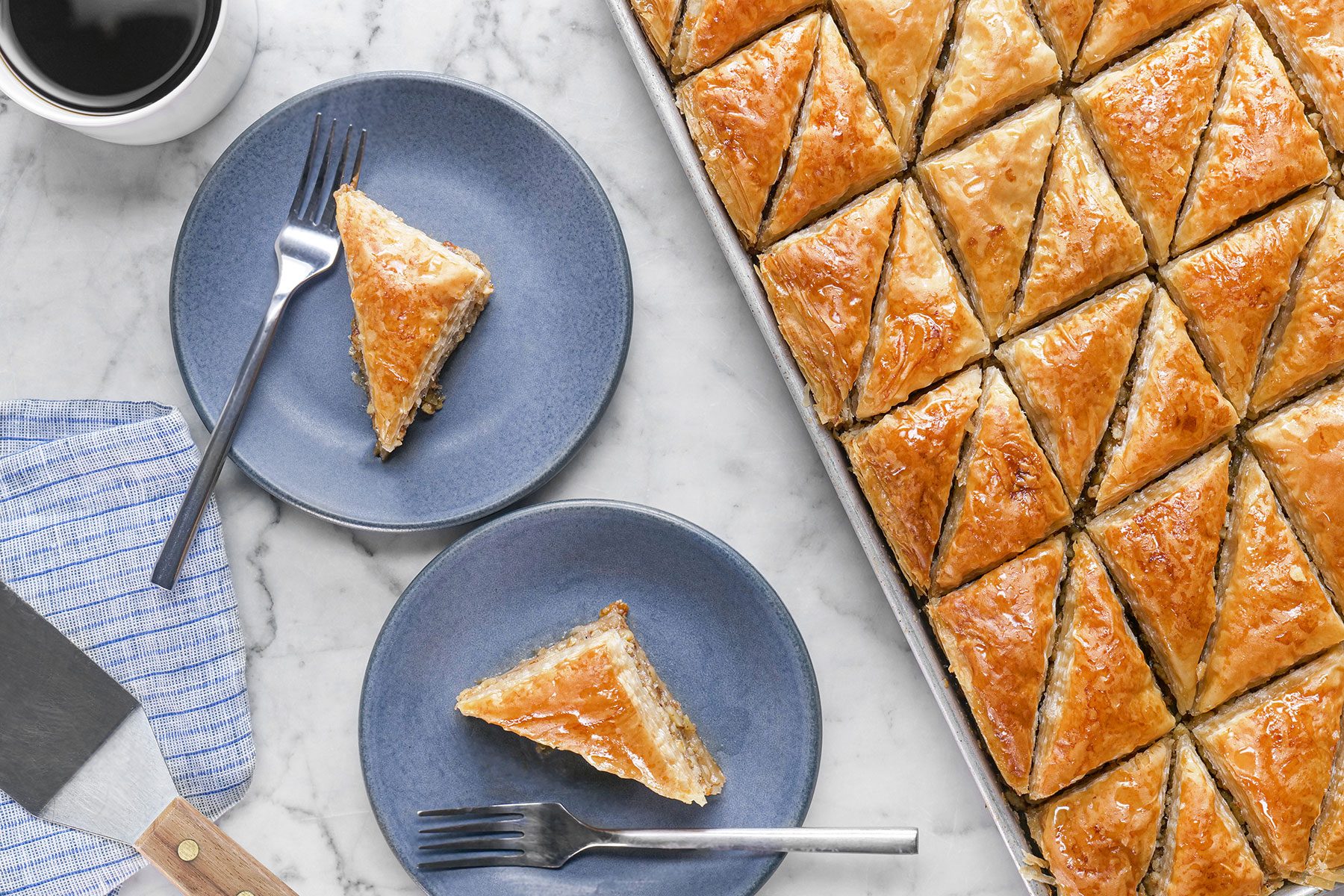 Baklava served in plates with fork