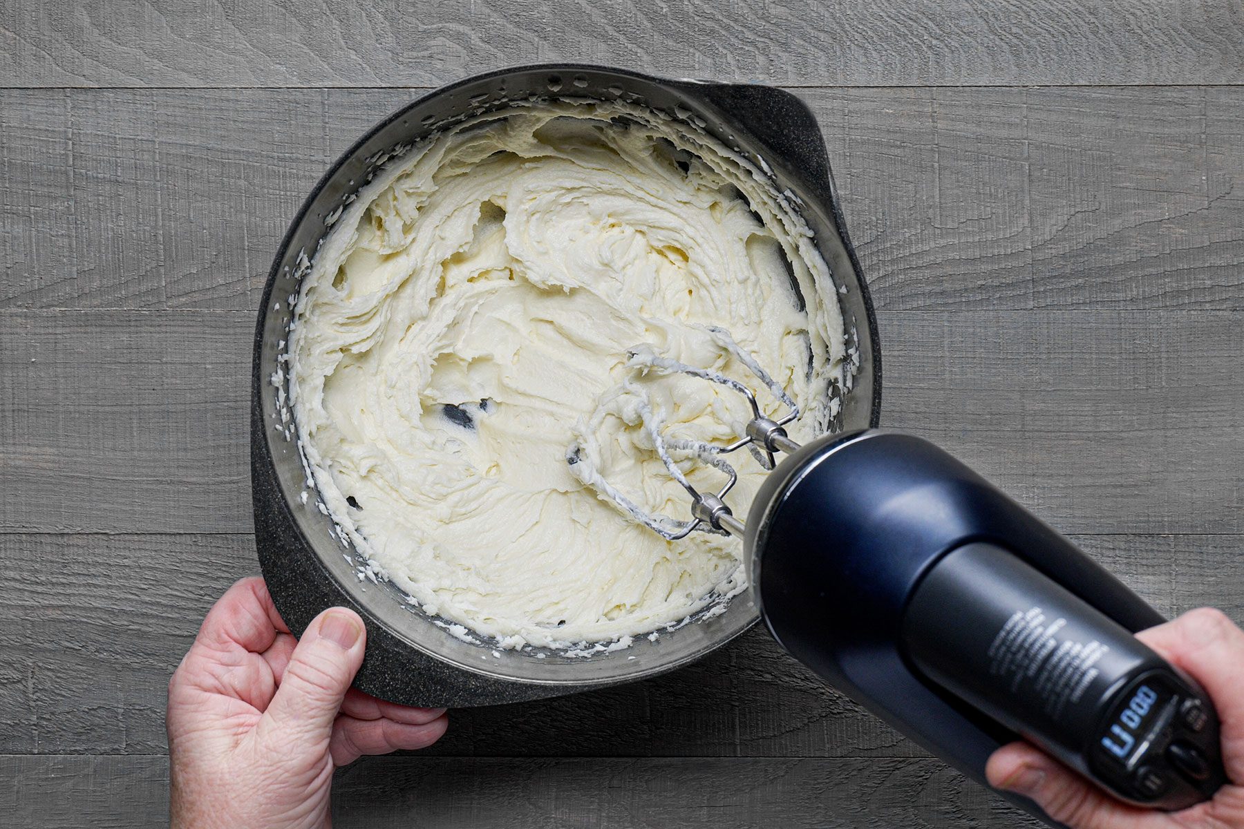 Mixing wet ingredients in a large bowl
