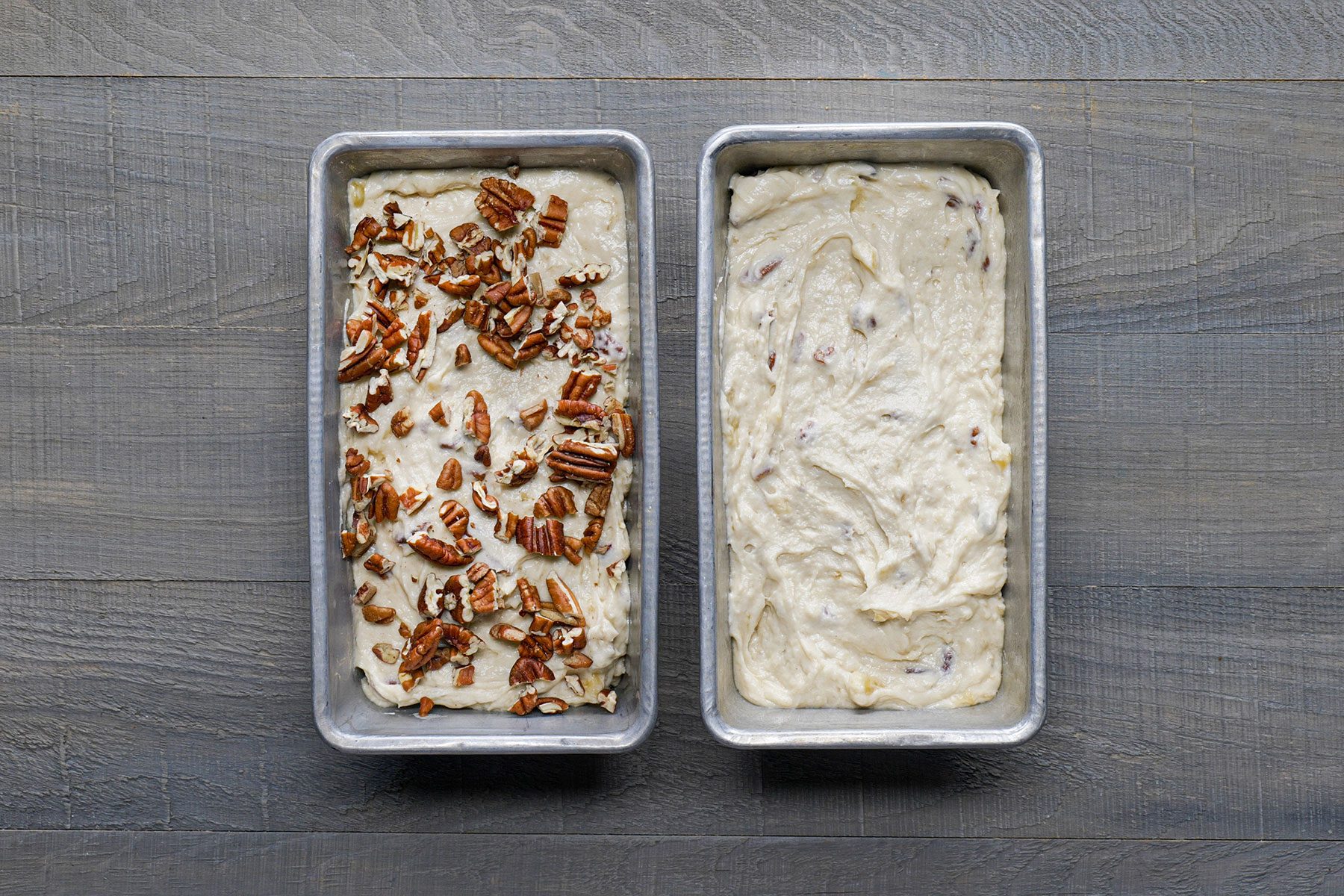 filled up two baking trays with dough one with pecans toppings 