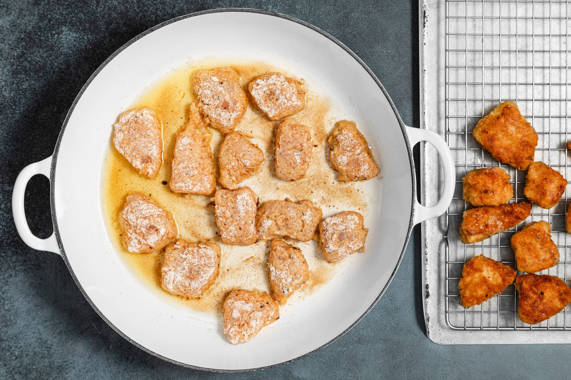 Cook the chicken in large skillet until golden brown and shift it to wire rack