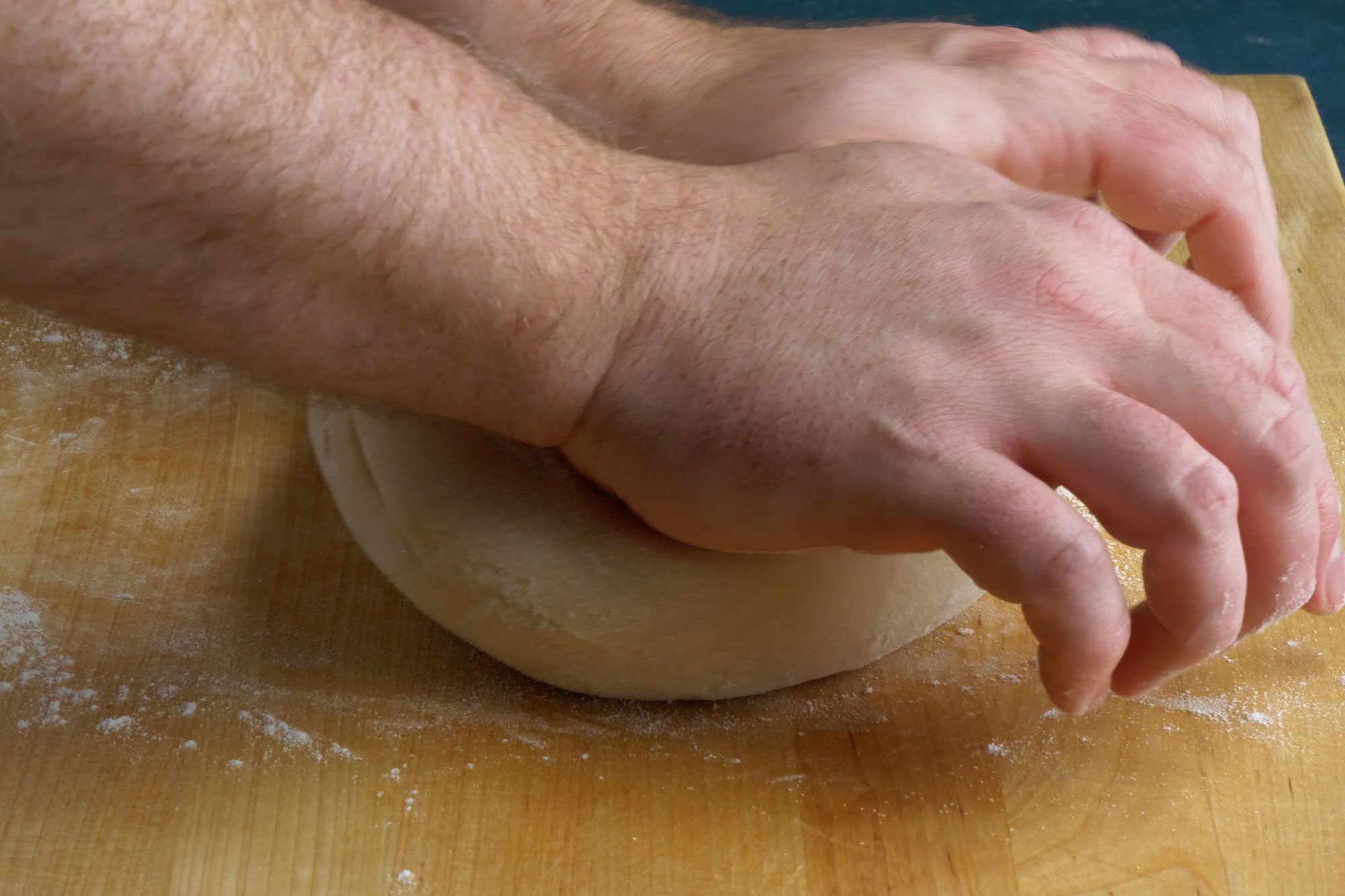 Knead the dough on floured surface