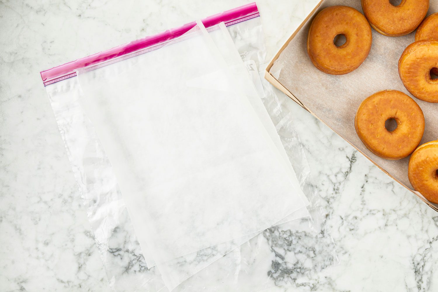 materials for Freezing Doughnuts laid out on a kitchen counter