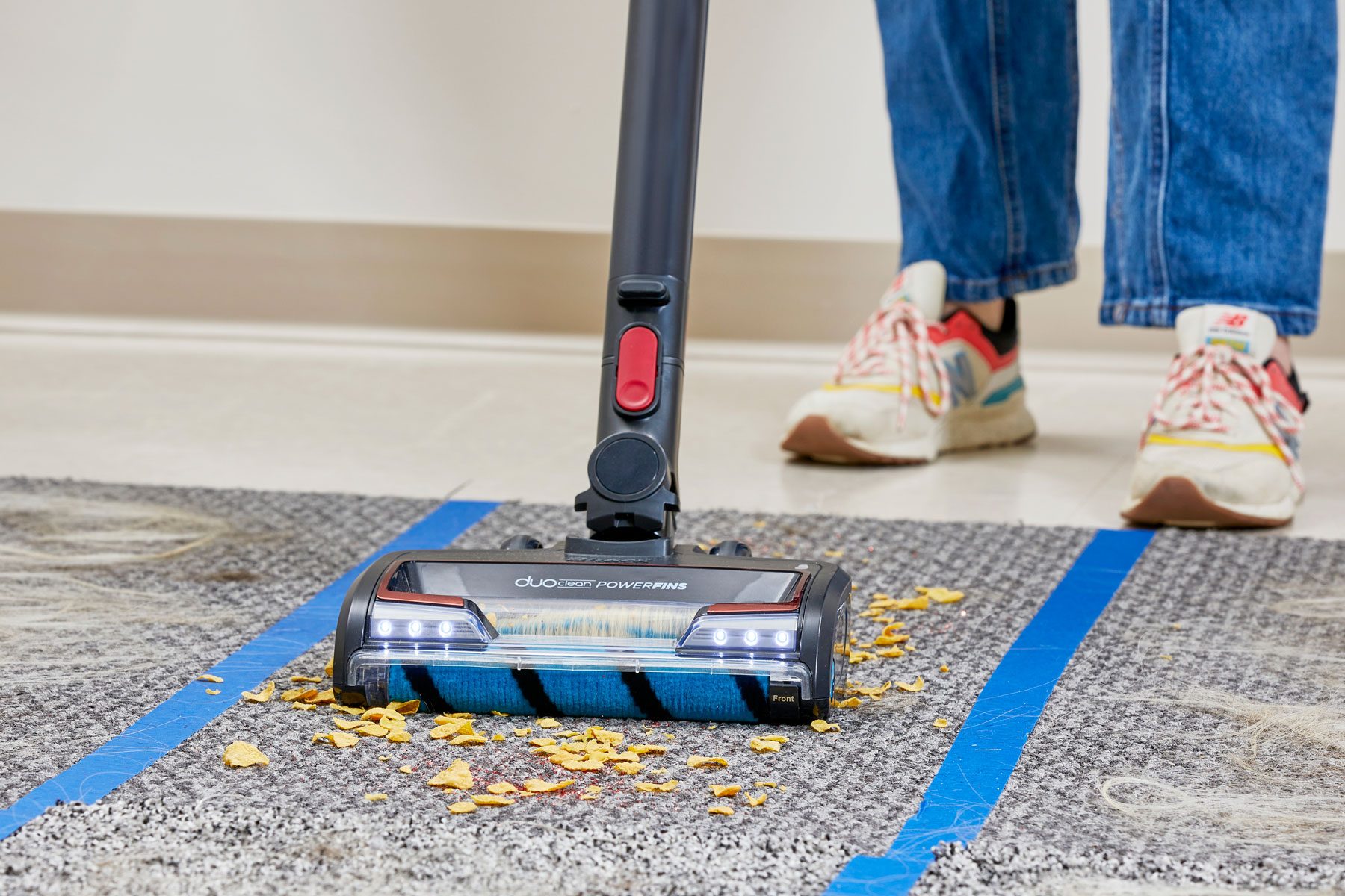 Cleaning the carpet with Shark vacuum