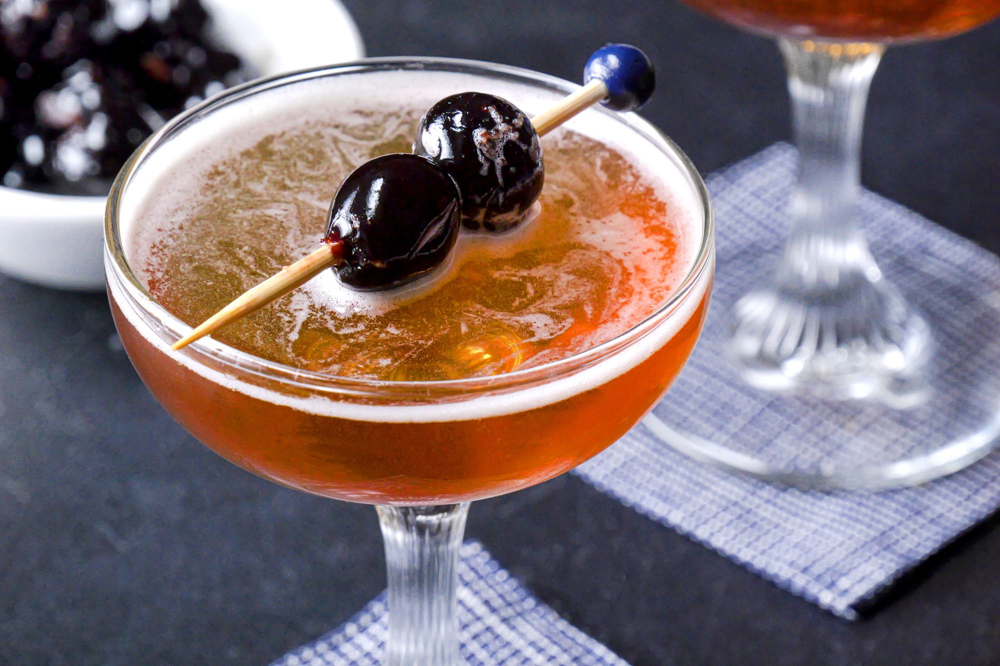 Rob Roy cocktails garnished with cherries