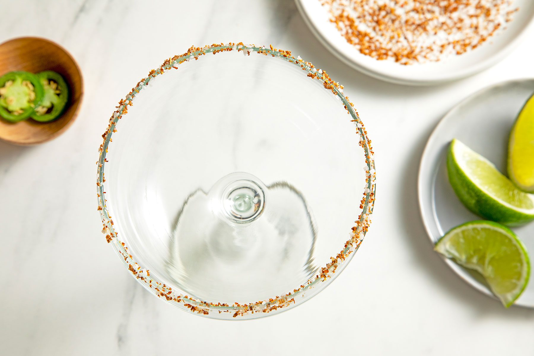 overhead shot of glass rim dipped in salt