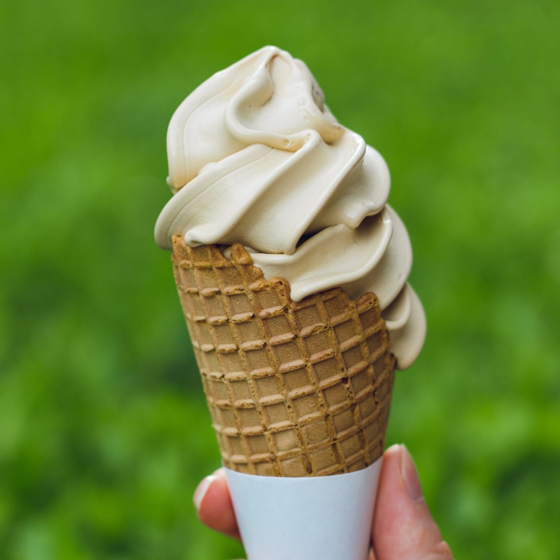 Hand holding ice cream