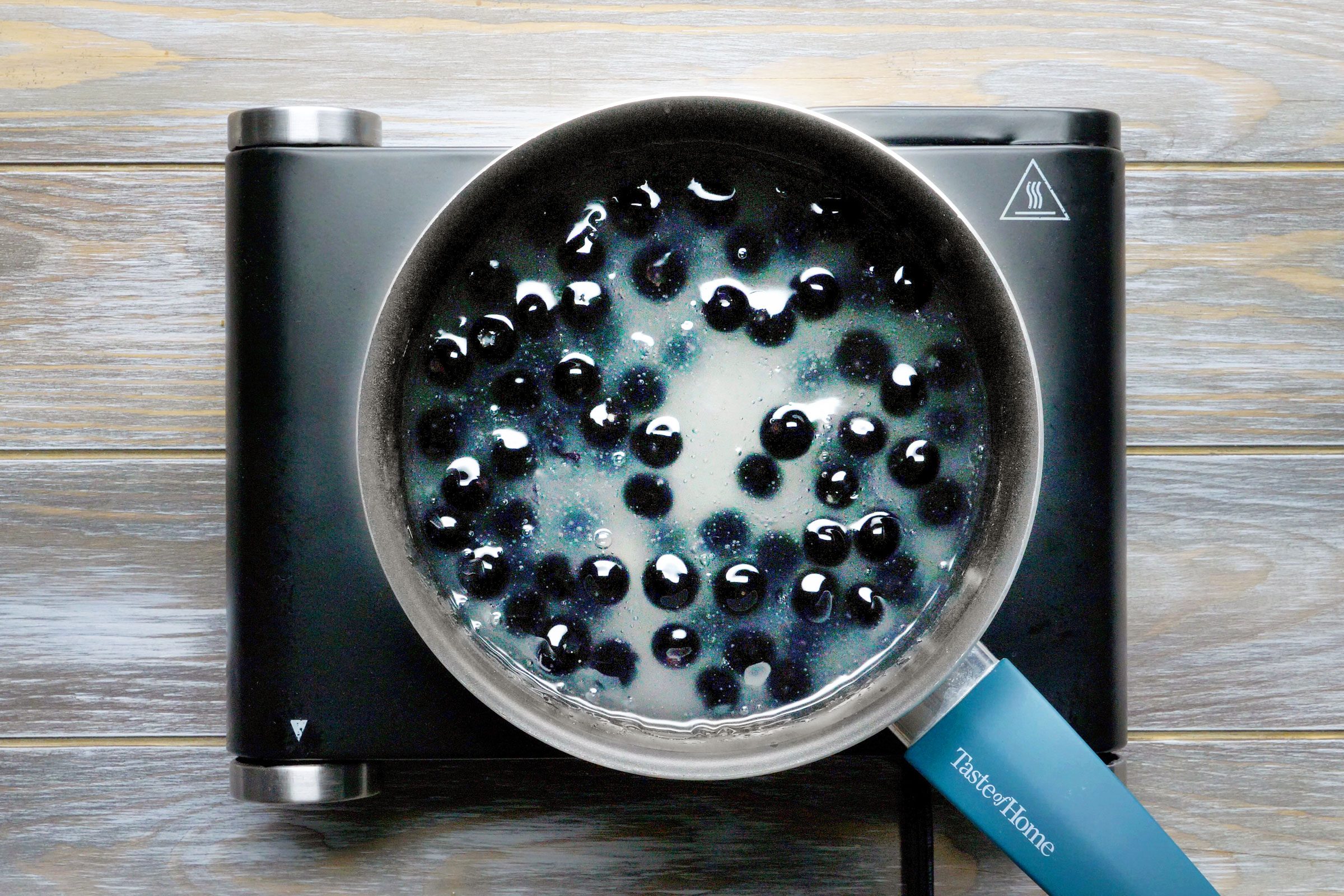 making blueberry sauce for french toast