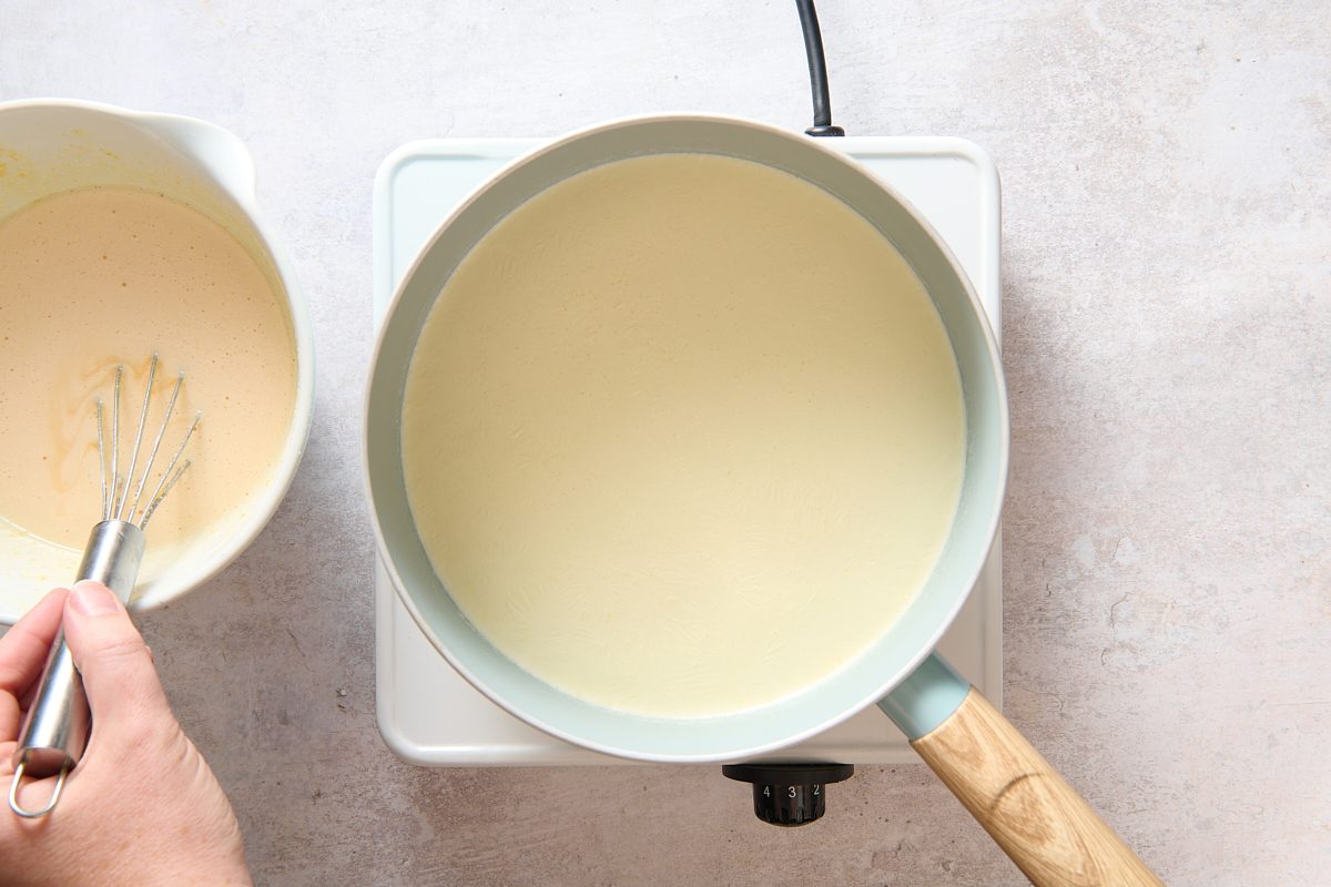 Heating pudding ingredients in a saucepan