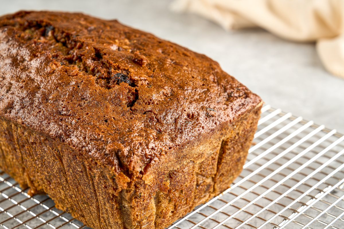 Pineapple Zucchini Bread loaf on a cooling rack