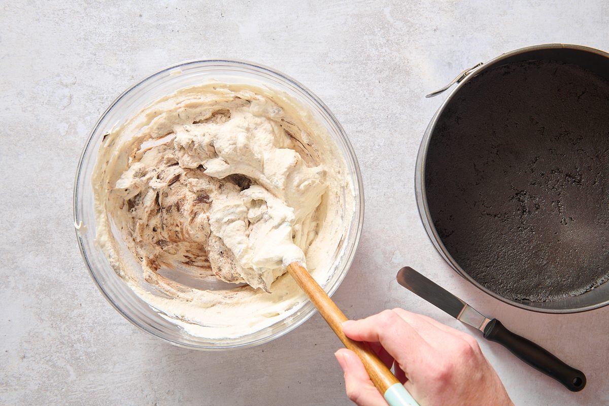 Folding the chocolate into whipped cream