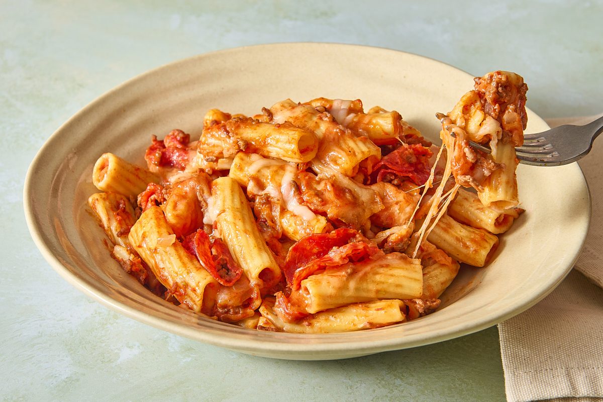 Shot of a cheesy forkful of slow cooker pizza casserole