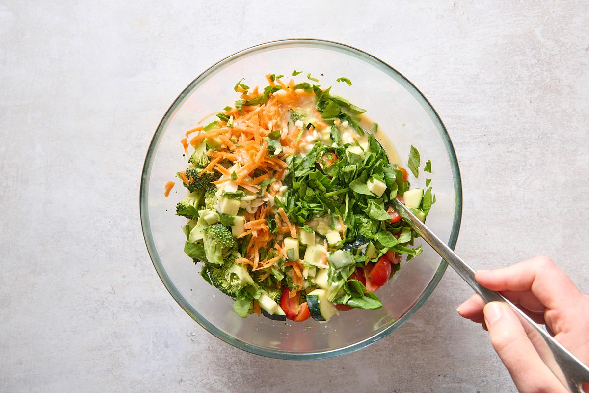 Combining ingredients in a large bowl