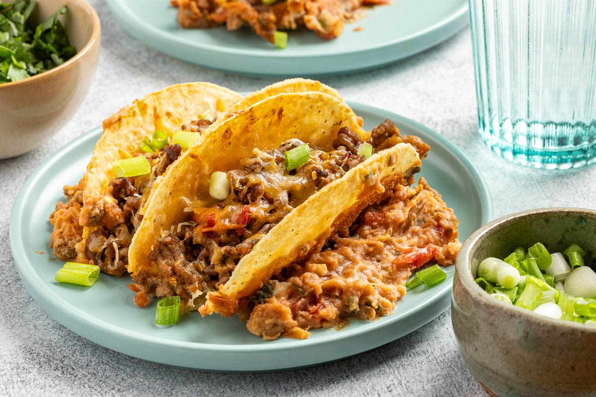 Taste of Home Baked Tacos recipe photo of the baked tacos served on plates.
