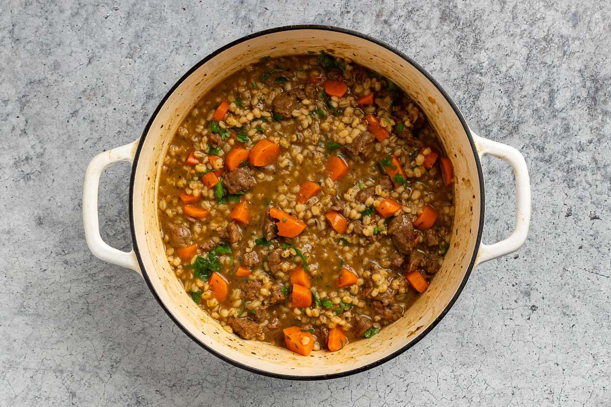 Taste of Home Beef Barley Stew recipe photo of the carrots and parsely added to the stew.