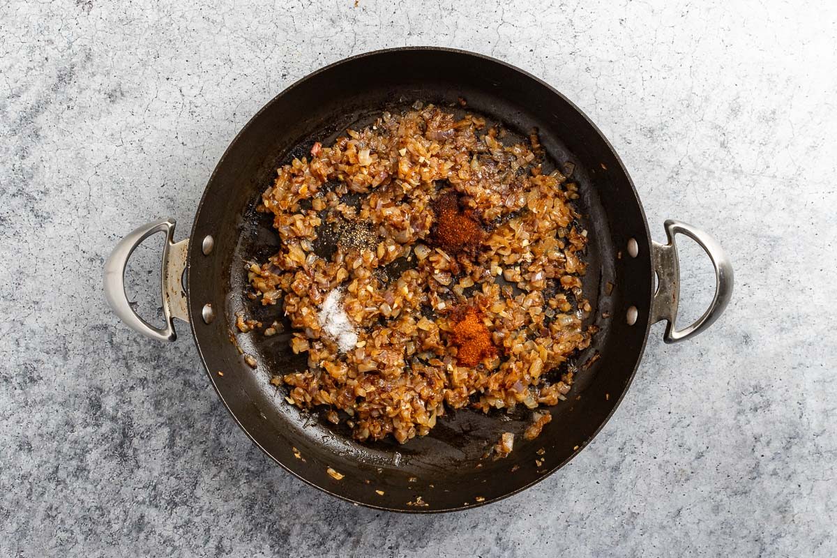 Taste of Home Bourbon Bacon Jam recipe photo of the carmeilzded onions with seasonings.