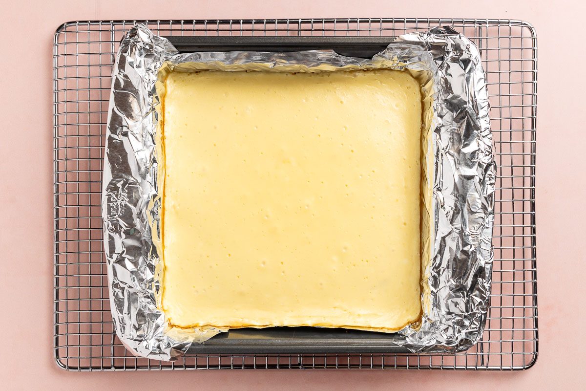 Taste of Home Cheesecake Bites recipe photo of the cooked cheese cake cooling on a rack.