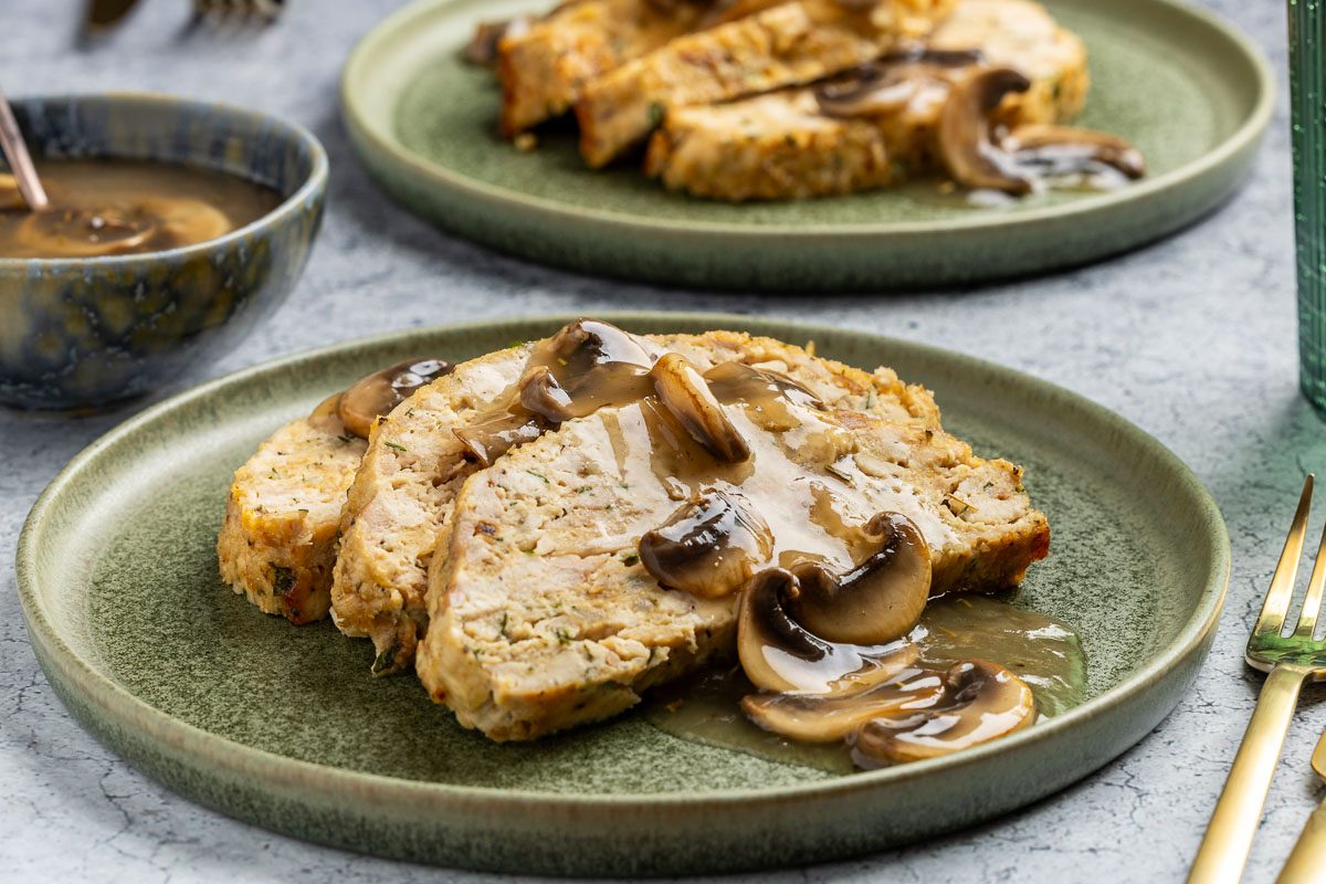 Taste of Home Chicken Loaf recipe photo of the finished recipe sliced and served on plates.