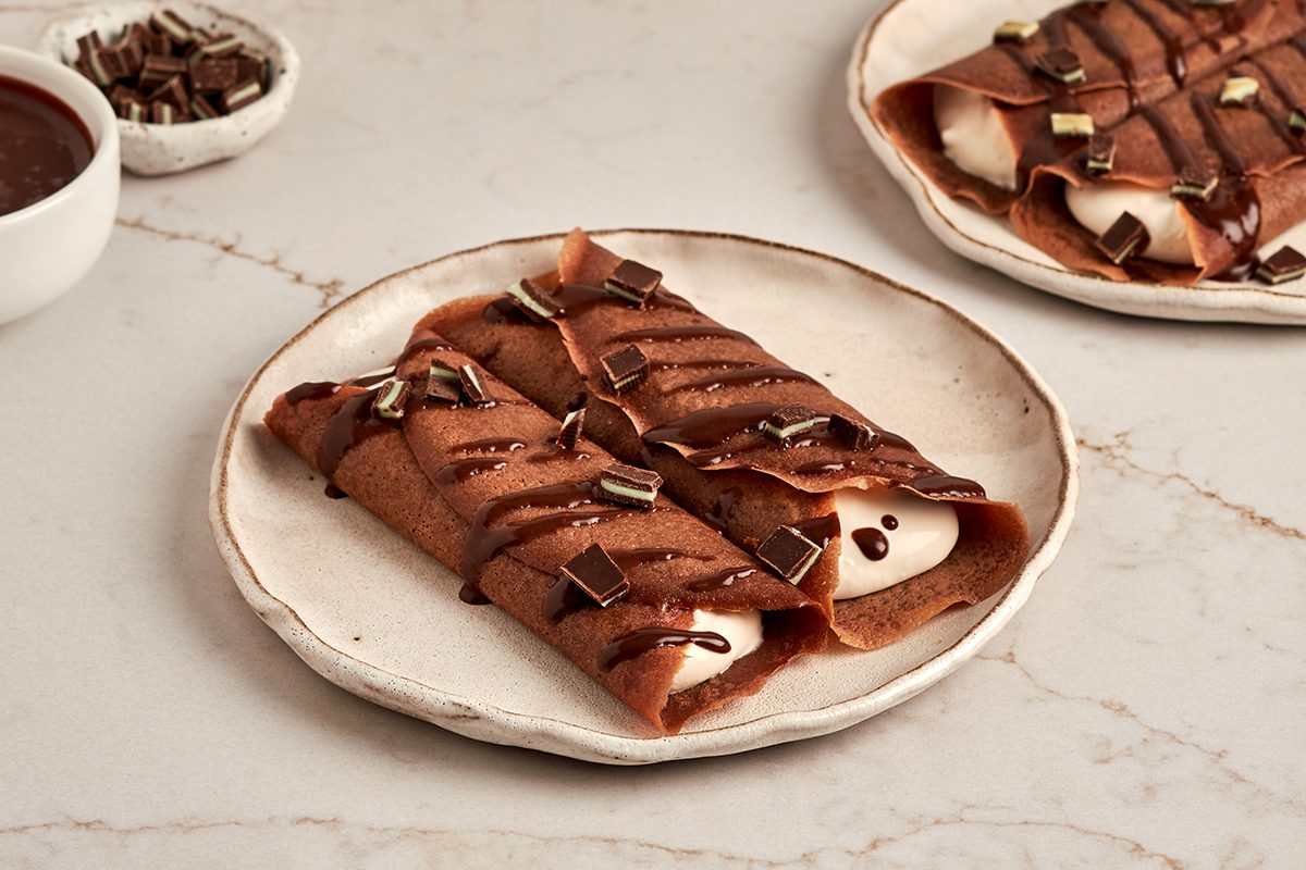 Chocolate crepes recipe by Taste of Home with cream filling.