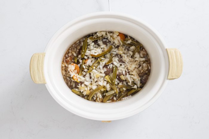 Chuck roast in slow cooker with veggies.